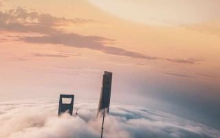 Skyscrapers touching Clouds