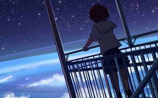Standing at Top of the World