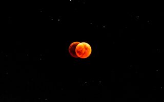 Amoled Red Moon Eclipse 4K iPhone 13 Wallpaper scaled