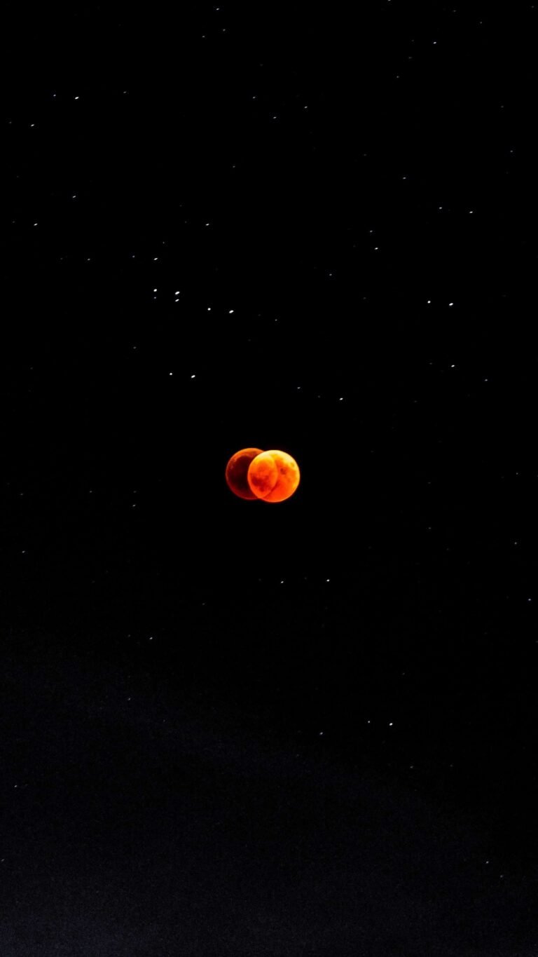 Amoled Red Moon Eclipse 4K iPhone 13 Wallpaper scaled