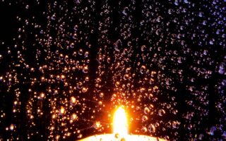 Rain View With Burning Candle 4K iPhone 13 Wallpaper scaled