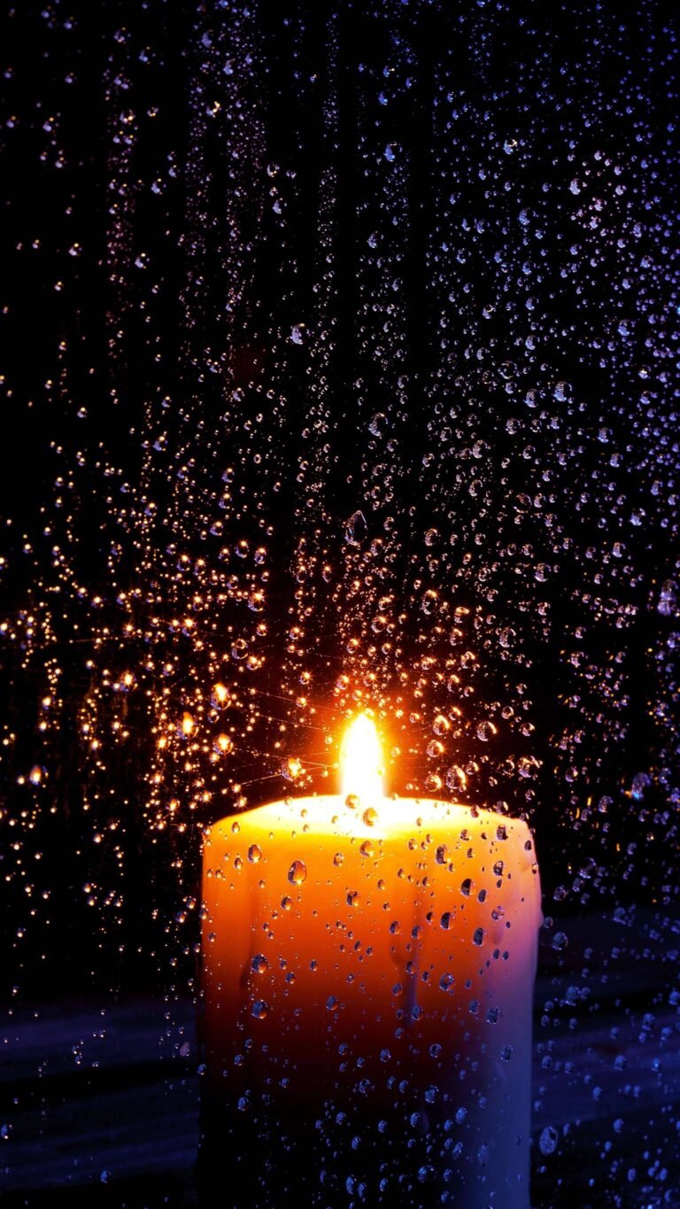Rain View With Burning Candle 4K iPhone 13 Wallpaper scaled