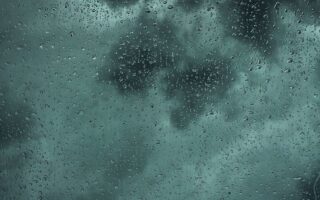 Rain With Dark Clouds 4K iPhone 13 Wallpaper scaled