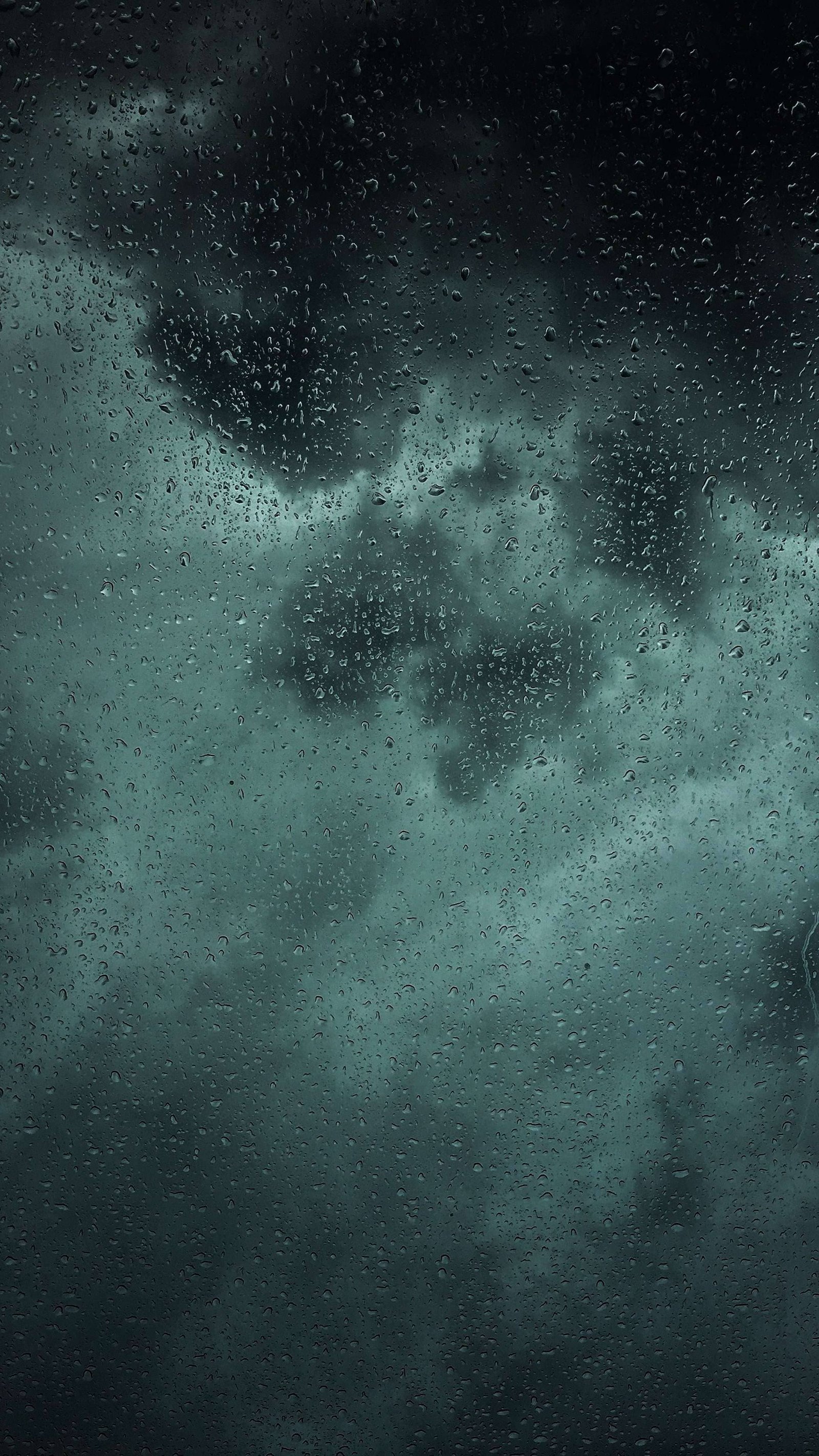 Rain-With-Dark-Clouds-4K-iPhone 13 Wallpaper