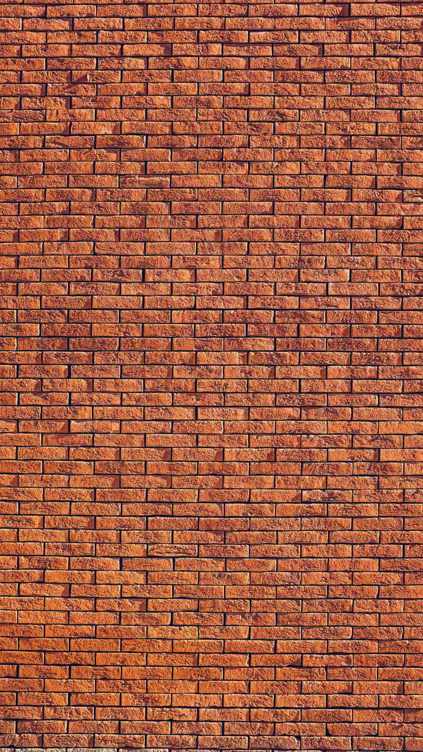 Wall Texture Bricks Light 4K iPhone 13 Wallpaper scaled